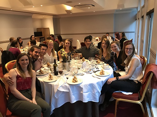 Image of a group of people having dinner